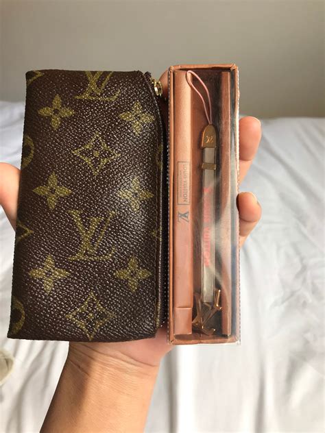 louis vuitton key chain wallet|louis vuitton key ring wallet.